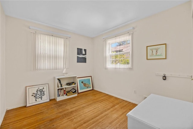 1077 Sharon Ct, Webster, NY 14580 - interior space featuring wood finished floors and plenty of natural light