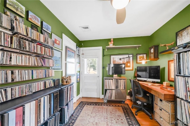 711 Colvin Blvd, Tonawanda, NY 14217 - office with wood finished floors, ceiling fan, and bookshelves
