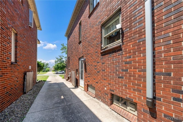 711 Colvin Blvd, Tonawanda, NY 14217 - view of side of home with brick siding