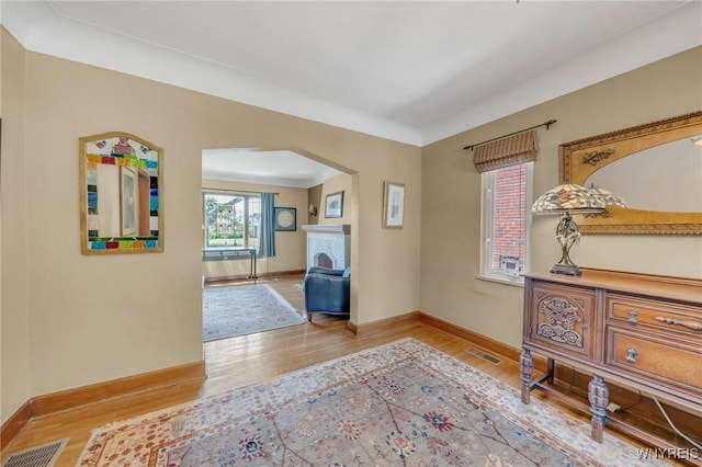 711 Colvin Blvd, Tonawanda, NY 14217 - corridor with light wood-style floors and arched walkways