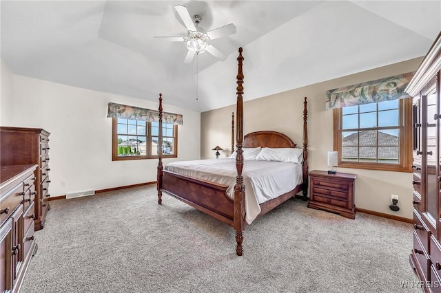 4584 Ridgeview Dr S, Pendleton, NY 14120 - carpeted bedroom with vaulted ceiling and ceiling fan