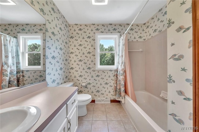 4584 Ridgeview Dr S, Pendleton, NY 14120 - bathroom with wallpapered walls, vanity, healthy amount of natural light, tile patterned floors, and shower / tub combo