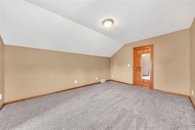 4584 Ridgeview Dr S, Pendleton, NY 14120 - additional living space featuring vaulted ceiling and carpet flooring