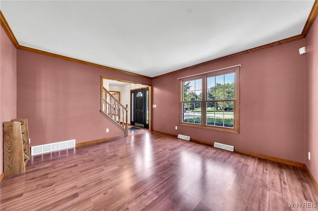 4584 Ridgeview Dr S, Pendleton, NY 14120 - unfurnished living room with ornamental molding, stairway, and wood finished floors