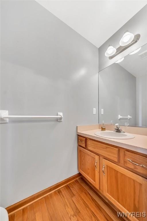 4584 Ridgeview Dr S, Pendleton, NY 14120 - bathroom featuring vanity and wood finished floors