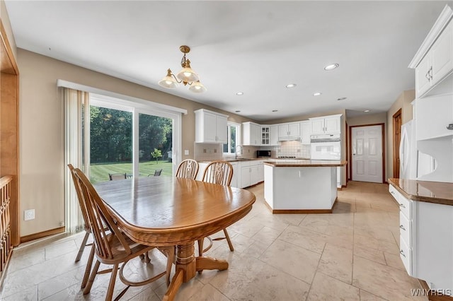 4584 Ridgeview Dr S, Pendleton, NY 14120 - dining room featuring recessed lighting and a chandelier