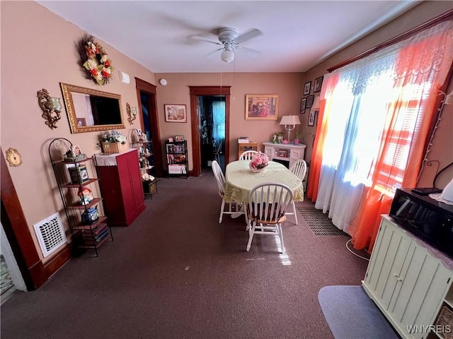 55 Harding Rd, Buffalo, NY 14220 - dining area featuring a ceiling fan and carpet flooring