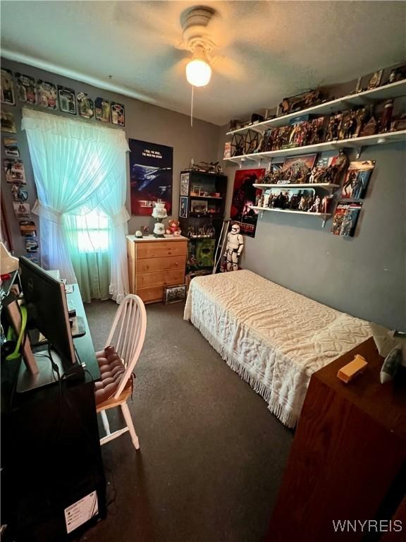 55 Harding Rd, Buffalo, NY 14220 - carpeted bedroom featuring a ceiling fan