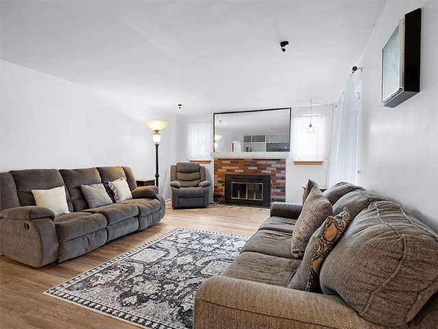 746 Dewitt Rd, Webster, NY 14580 - living room with wood finished floors and a brick fireplace