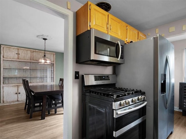 746 Dewitt Rd, Webster, NY 14580 - kitchen with appliances with stainless steel finishes and light wood-style floors