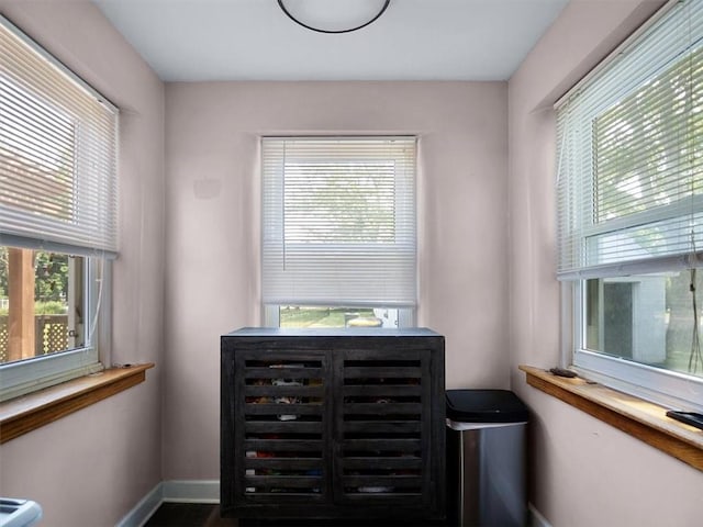 746 Dewitt Rd, Webster, NY 14580 - entryway with baseboards and wood finished floors