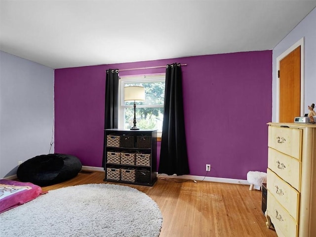 746 Dewitt Rd, Webster, NY 14580 - bedroom with light wood-style floors and baseboards