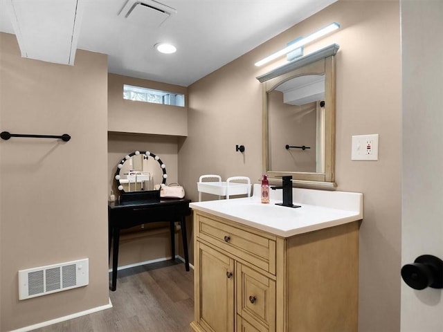 746 Dewitt Rd, Webster, NY 14580 - bathroom with wood finished floors and vanity