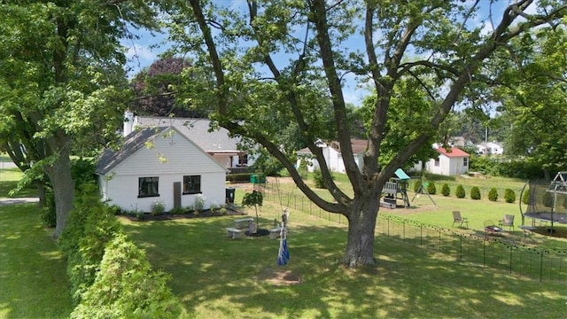 746 Dewitt Rd, Webster, NY 14580 - rear view of property featuring a trampoline and a playground