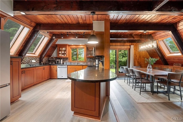 6139 Commane Rd, Lafayette, NY 13084 - kitchen with a skylight, stainless steel appliances, wooden ceiling, plenty of natural light, and light wood-style flooring