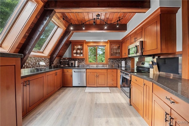 6139 Commane Rd, Lafayette, NY 13084 - kitchen with appliances with stainless steel finishes, a wood ceiling with exposed beams, light wood finished floors, glass insert cabinets, and tasteful backsplash