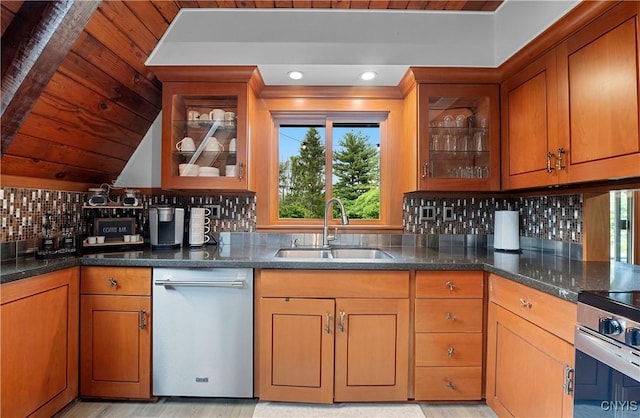 6139 Commane Rd, Lafayette, NY 13084 - kitchen with appliances with stainless steel finishes, healthy amount of natural light, dark stone countertops, brown cabinetry, and wood ceiling