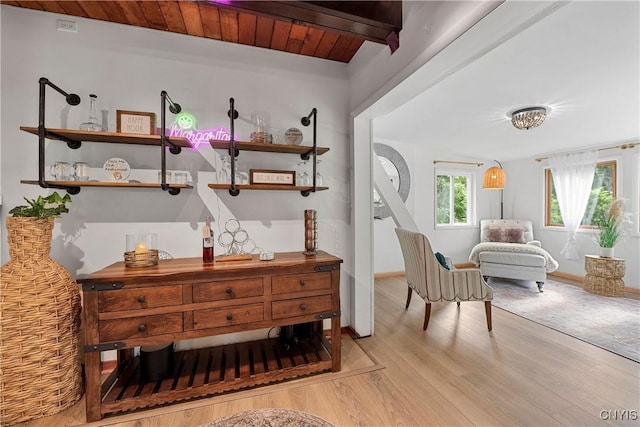 6139 Commane Rd, Lafayette, NY 13084 - sitting room featuring light wood finished floors and beam ceiling