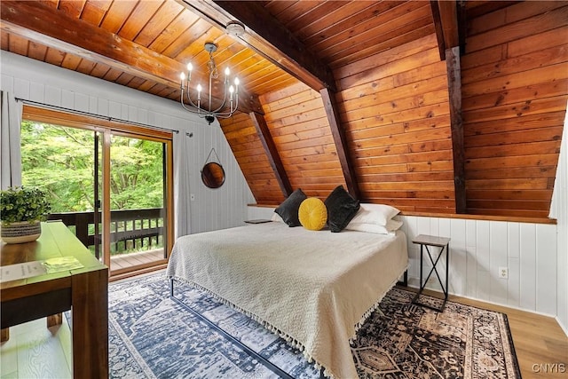 6139 Commane Rd, Lafayette, NY 13084 - bedroom featuring wooden ceiling, wood finished floors, access to exterior, a chandelier, and wooden walls