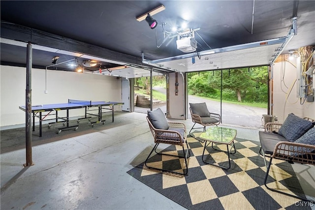 6139 Commane Rd, Lafayette, NY 13084 - garage featuring a garage door opener