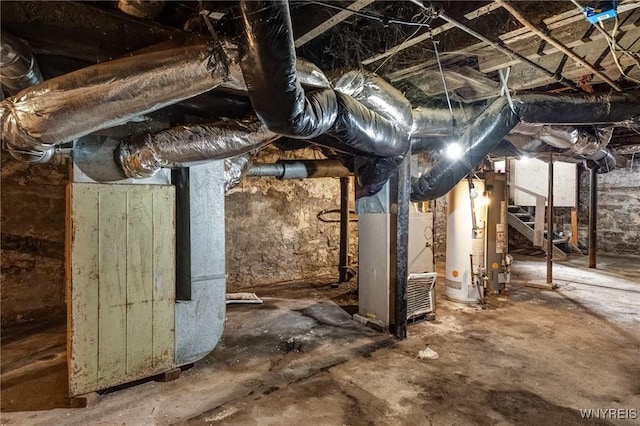 76 Chester St, Buffalo, NY 14208 - unfinished basement with gas water heater, stairway, and heating unit