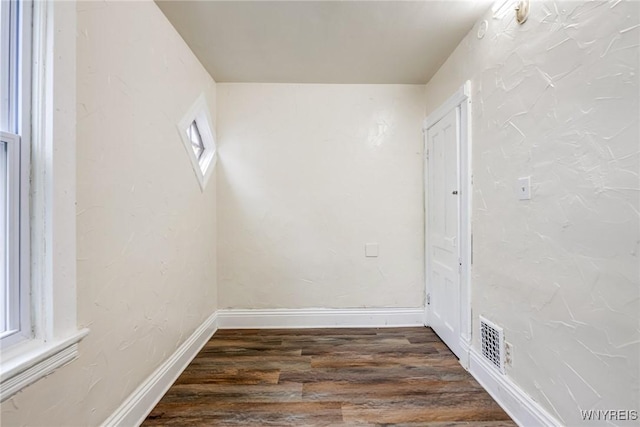 76 Chester St, Buffalo, NY 14208 - spare room with wood finished floors and baseboards