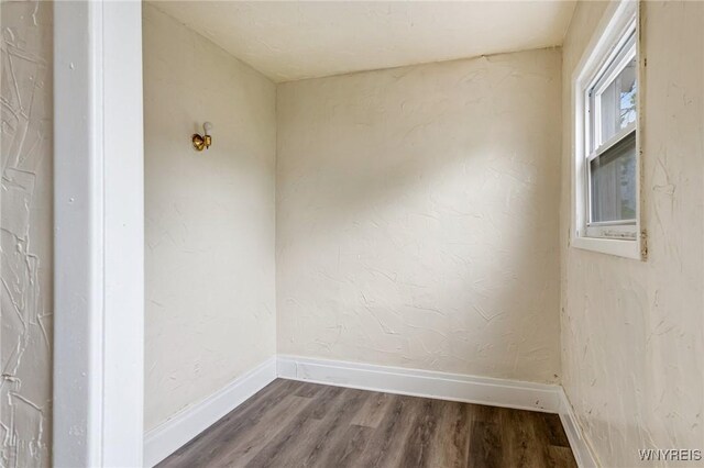 76 Chester St, Buffalo, NY 14208 - spare room with wood finished floors and baseboards