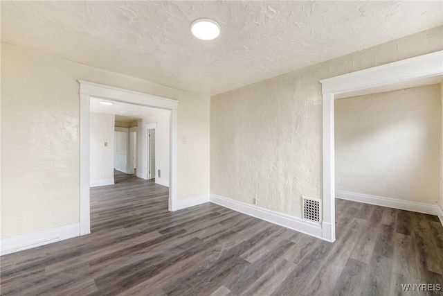 76 Chester St, Buffalo, NY 14208 - spare room featuring wood finished floors and a textured wall