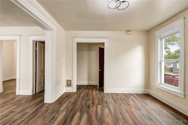 76 Chester St, Buffalo, NY 14208 - spare room with dark wood-style flooring and baseboards