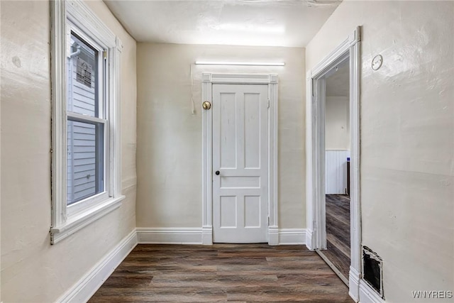 76 Chester St, Buffalo, NY 14208 - foyer entrance with dark wood-type flooring and baseboards