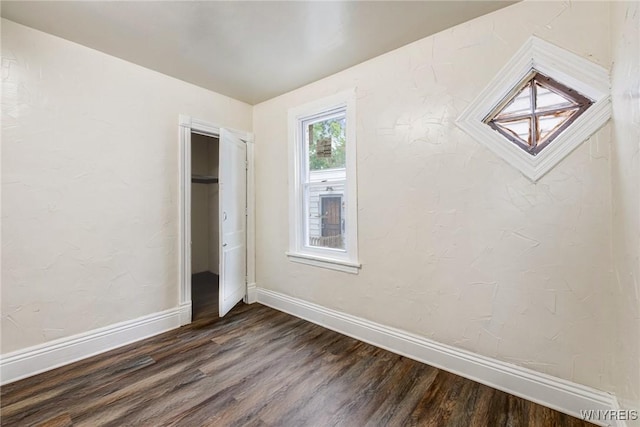76 Chester St, Buffalo, NY 14208 - unfurnished bedroom featuring dark wood-type flooring