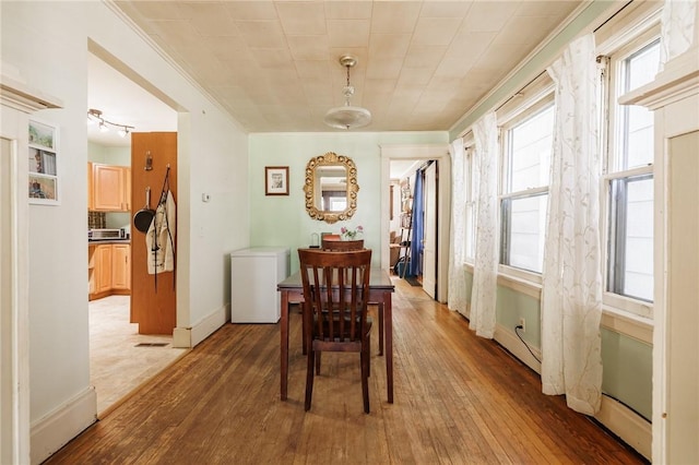 36.5 Austin St, Rochester, NY 14606 - dining area featuring ornamental molding and light wood-style floors