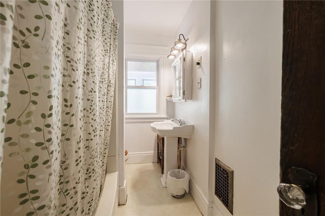 36.5 Austin St, Rochester, NY 14606 - full bath featuring baseboards and shower / bath combo