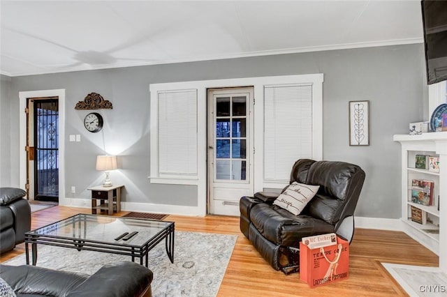 301 Arlington Ave Unit 3, Syracuse, NY 13207 - living area with ornamental molding and wood finished floors