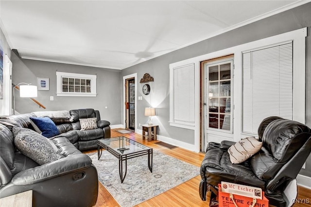301 Arlington Ave Unit 3, Syracuse, NY 13207 - living room with wood finished floors, ceiling fan, and ornamental molding
