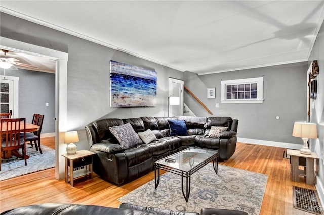 301 Arlington Ave Unit 3, Syracuse, NY 13207 - living area with wood finished floors, a ceiling fan, and stairway