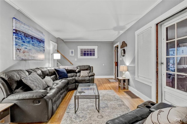 301 Arlington Ave Unit 3, Syracuse, NY 13207 - living room with light wood-style flooring and ornamental molding