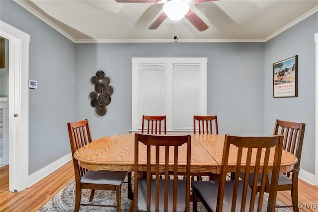 301 Arlington Ave Unit 3, Syracuse, NY 13207 - dining space featuring light wood-style flooring, crown molding, and a ceiling fan
