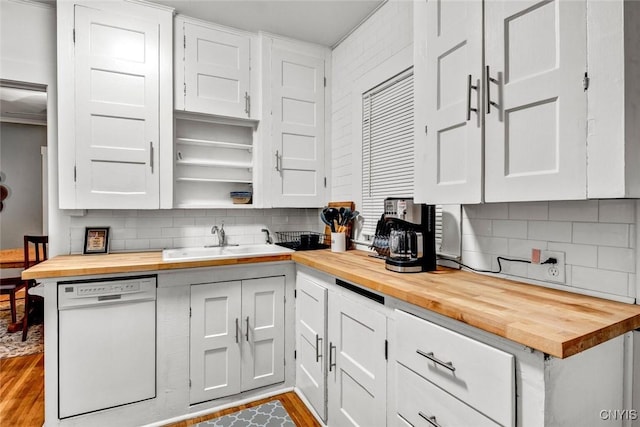 301 Arlington Ave Unit 3, Syracuse, NY 13207 - kitchen with butcher block countertops, white dishwasher, tasteful backsplash, and wood finished floors