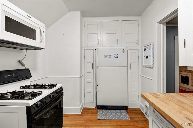 301 Arlington Ave Unit 3, Syracuse, NY 13207 - kitchen featuring white appliances, butcher block counters, light wood-style flooring, and vaulted ceiling