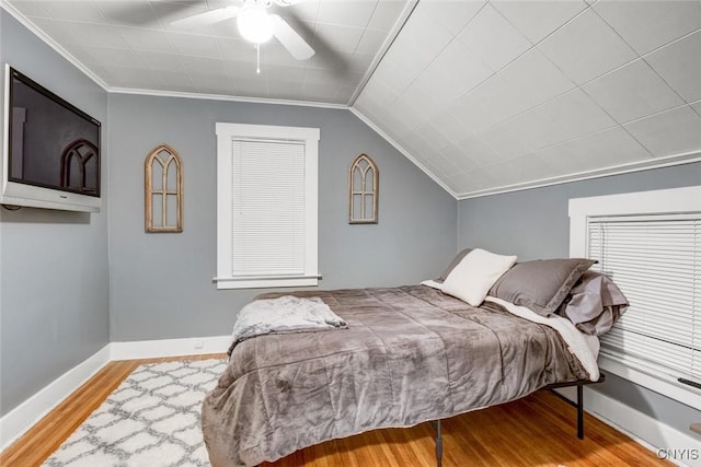301 Arlington Ave Unit 3, Syracuse, NY 13207 - bedroom with wood finished floors, a ceiling fan, vaulted ceiling, and ornamental molding