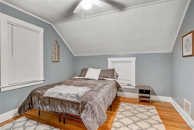 301 Arlington Ave Unit 3, Syracuse, NY 13207 - bedroom featuring wood finished floors, lofted ceiling, and a ceiling fan