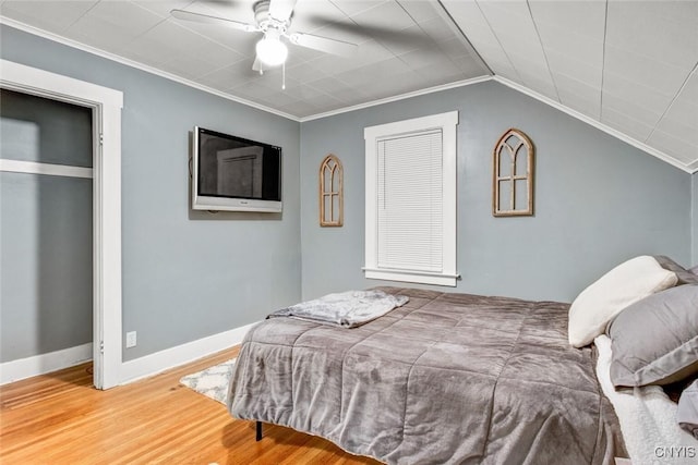 301 Arlington Ave Unit 3, Syracuse, NY 13207 - bedroom with wood finished floors, crown molding, ceiling fan, and vaulted ceiling
