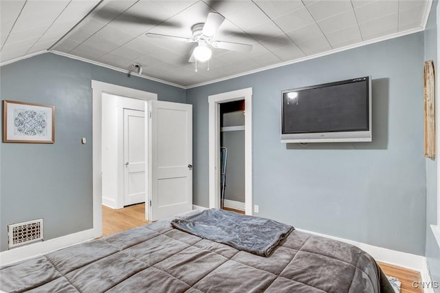 301 Arlington Ave Unit 3, Syracuse, NY 13207 - bedroom featuring wood finished floors, ornamental molding, ceiling fan, and a closet