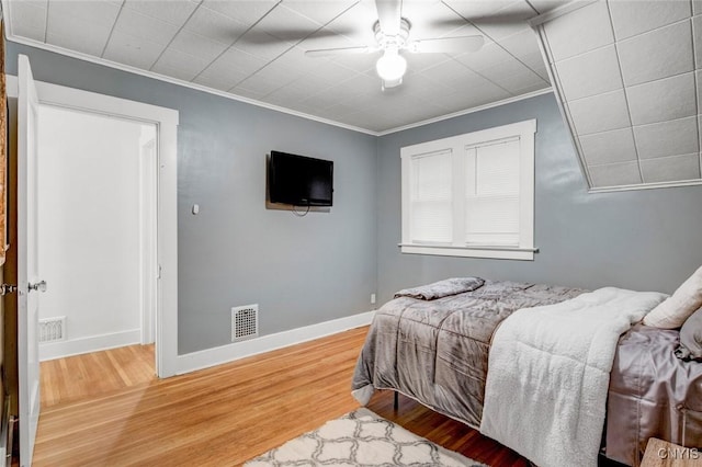 301 Arlington Ave Unit 3, Syracuse, NY 13207 - bedroom featuring ornamental molding, wood finished floors, and a ceiling fan