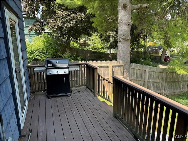 301 Arlington Ave Unit 3, Syracuse, NY 13207 - wooden terrace with a grill and a fenced backyard