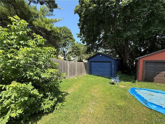 301 Arlington Ave Unit 3, Syracuse, NY 13207 - view of yard with an outbuilding and a detached garage