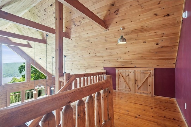 6094 State Route 21, South Bristol, NY 14512 - hallway with high vaulted ceiling, wood-type flooring, a wooden ceiling with exposed beams, and wooden walls