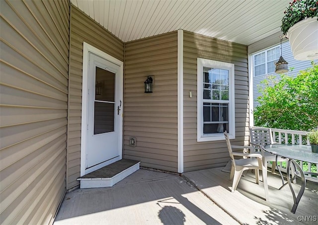 4203 Sandbar Ln, Clay, NY 13090 - doorway to property featuring outdoor dining area