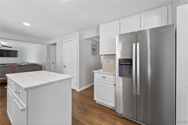 208 Single Dr, Clay, NY 13212 - kitchen with stainless steel refrigerator with ice dispenser, dark wood finished floors, white cabinetry, tasteful backsplash, and recessed lighting